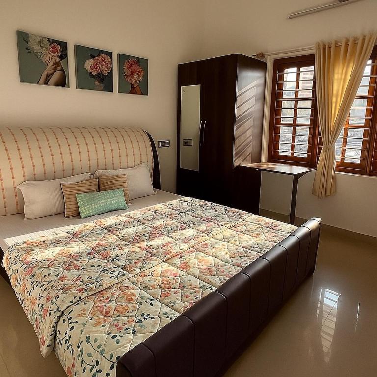 Postel nebo postele na pokoji v ubytování MyYearlyStay in Udupi