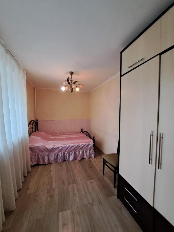Postel nebo postele na pokoji v ubytování Подобова оренда квартири, Чорноморськ Паркова вулиця , 16