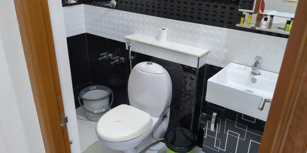 Koupelna v ubytování Swapna Home Suites