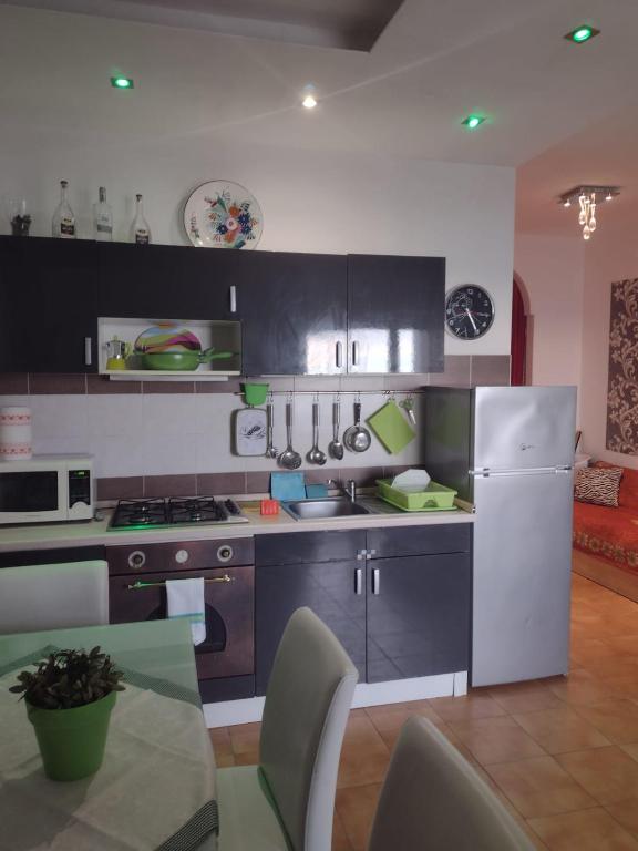 Kuchyň nebo kuchyňský kout v ubytování Casa sul mare