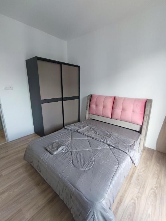 Ένα ή περισσότερα κρεβάτια σε δωμάτιο στο Kuching P Residence Apartment Batu Kawa