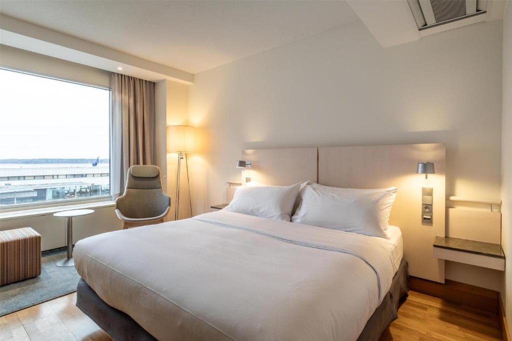 Postel nebo postele na pokoji v ubytování Hilton Helsinki Kalastajatorppa