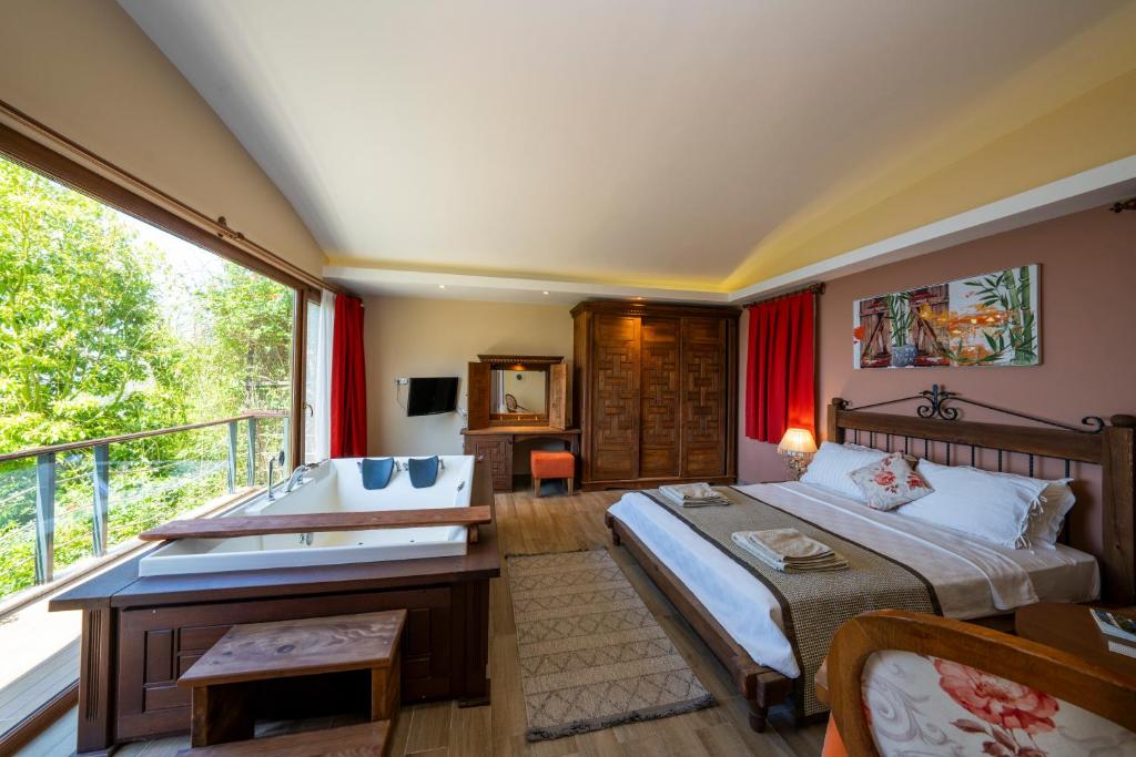 Postel nebo postele na pokoji v ubytování Lissiya Hotel