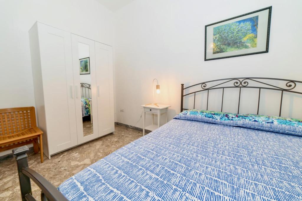 Posteľ alebo postele v izbe v ubytovaní RobertONE Guest House