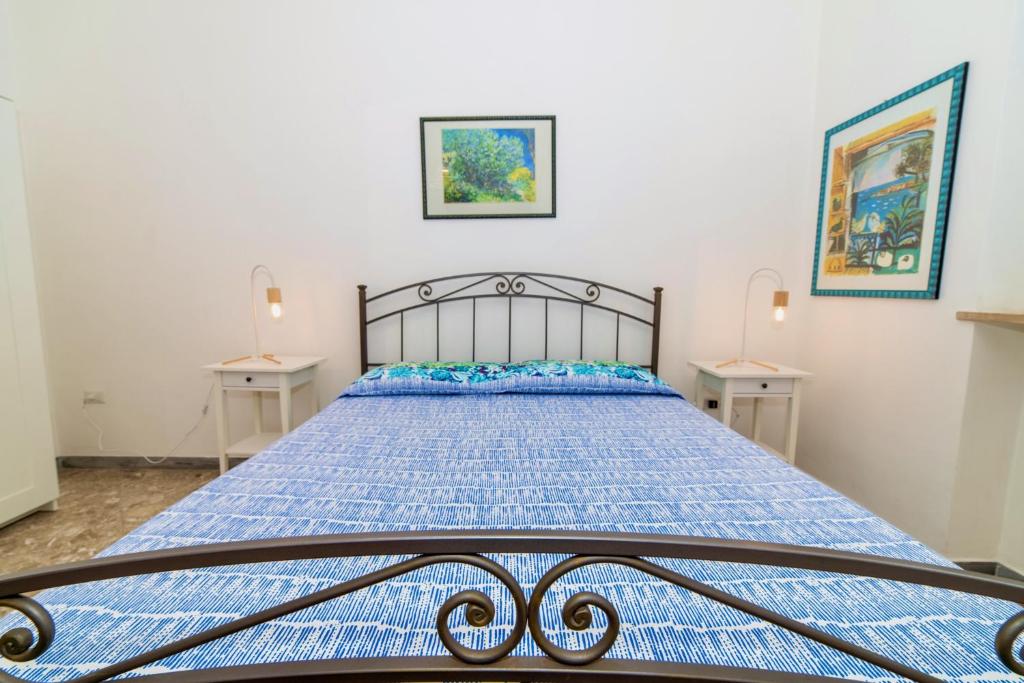 Posteľ alebo postele v izbe v ubytovaní RobertONE Guest House
