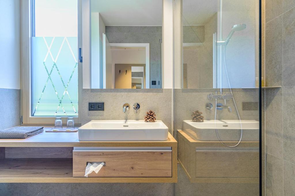 Koupelna v ubytování Hotel Die Alm