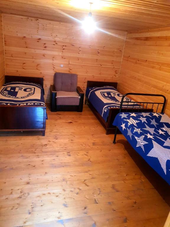 Postel nebo postele na pokoji v ubytování guest house "BETQIL" adishi