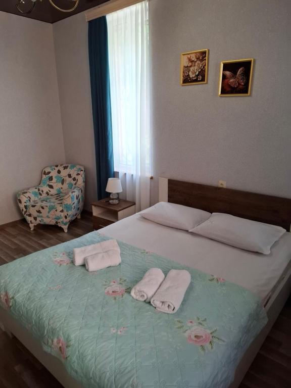 Postel nebo postele na pokoji v ubytování Mango's Guesthouse