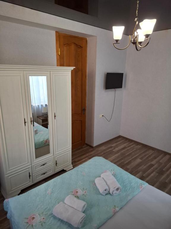Postel nebo postele na pokoji v ubytování Mango's Guesthouse