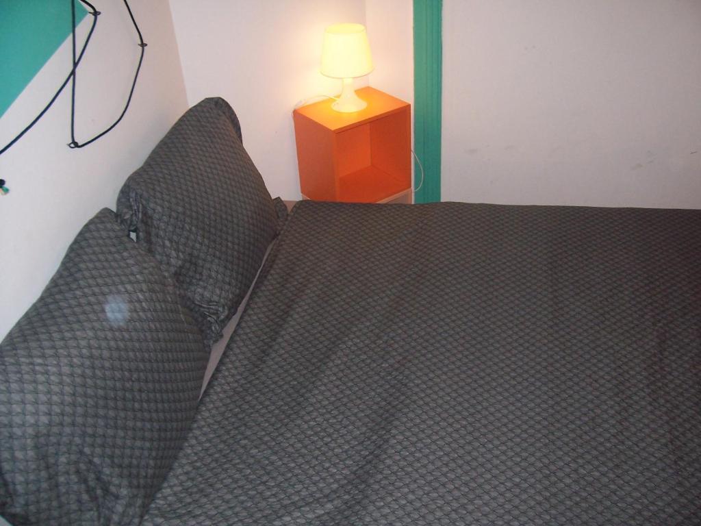 Posteľ alebo postele v izbe v ubytovaní Spark Apartment