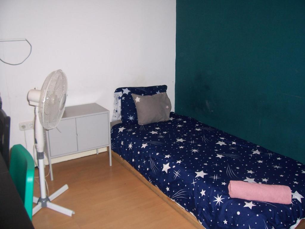 Posteľ alebo postele v izbe v ubytovaní Spark Apartment