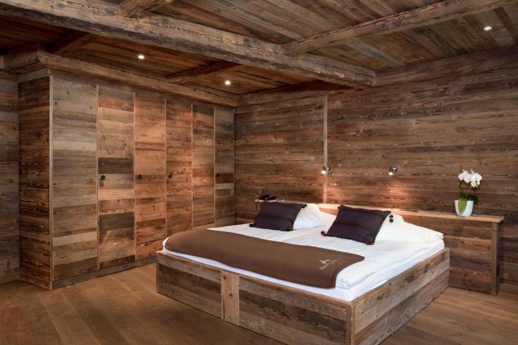 Postel nebo postele na pokoji v ubytování Hotel Etrier