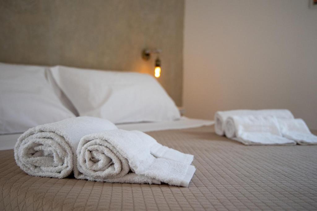 Giường trong phòng chung tại Da Zia Manny