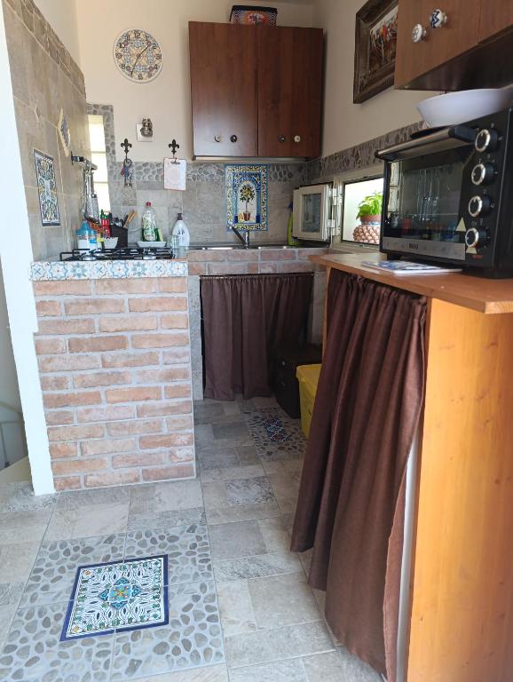 A kitchen or kitchenette at Torre Vallelunga