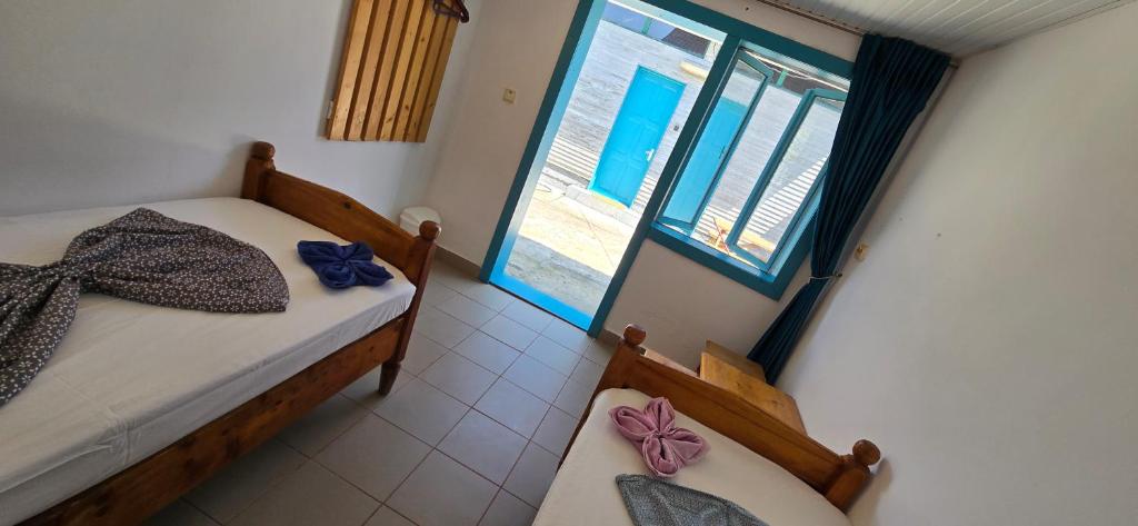 Postel nebo postele na pokoji v ubytování Camere Orizont