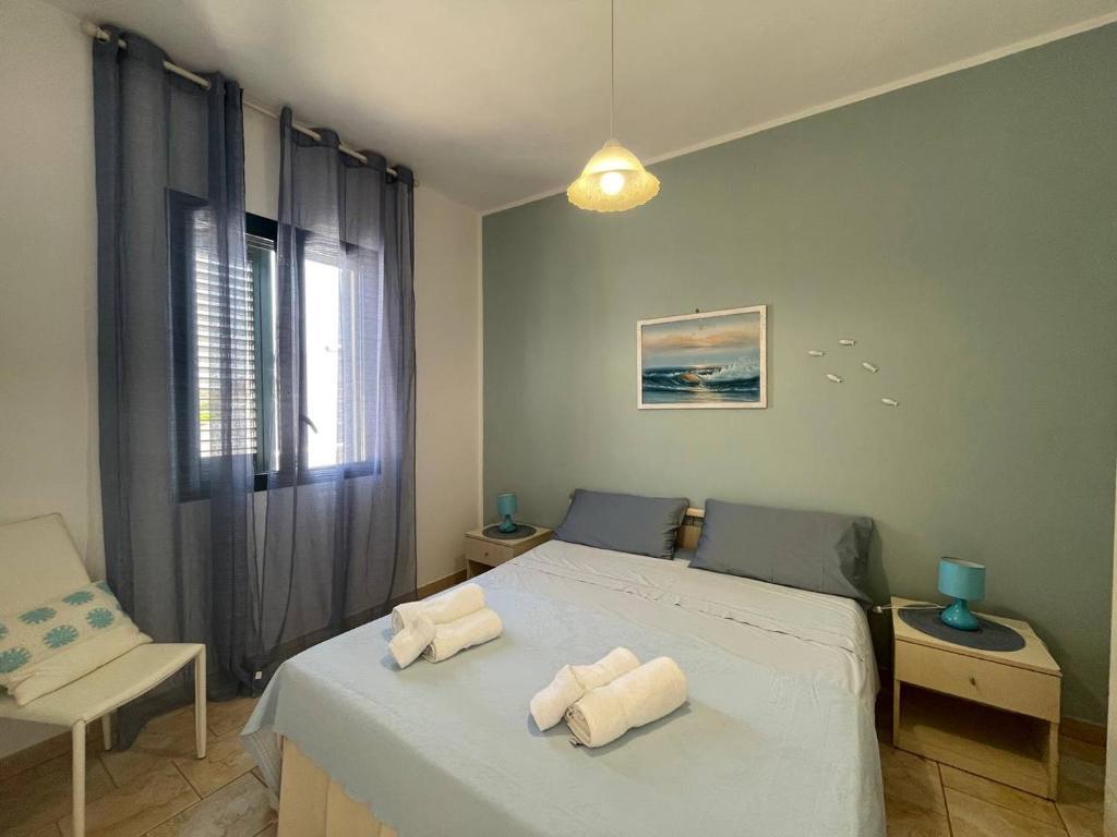Letto o letti in una camera di Casa Vacanza ORO BLU DEL SALENTO