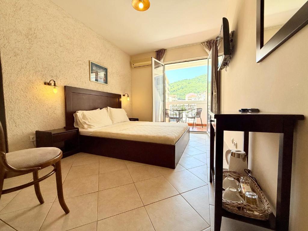 Villa Perla Di Mare Budva tesisinde bir odada yatak veya yataklar