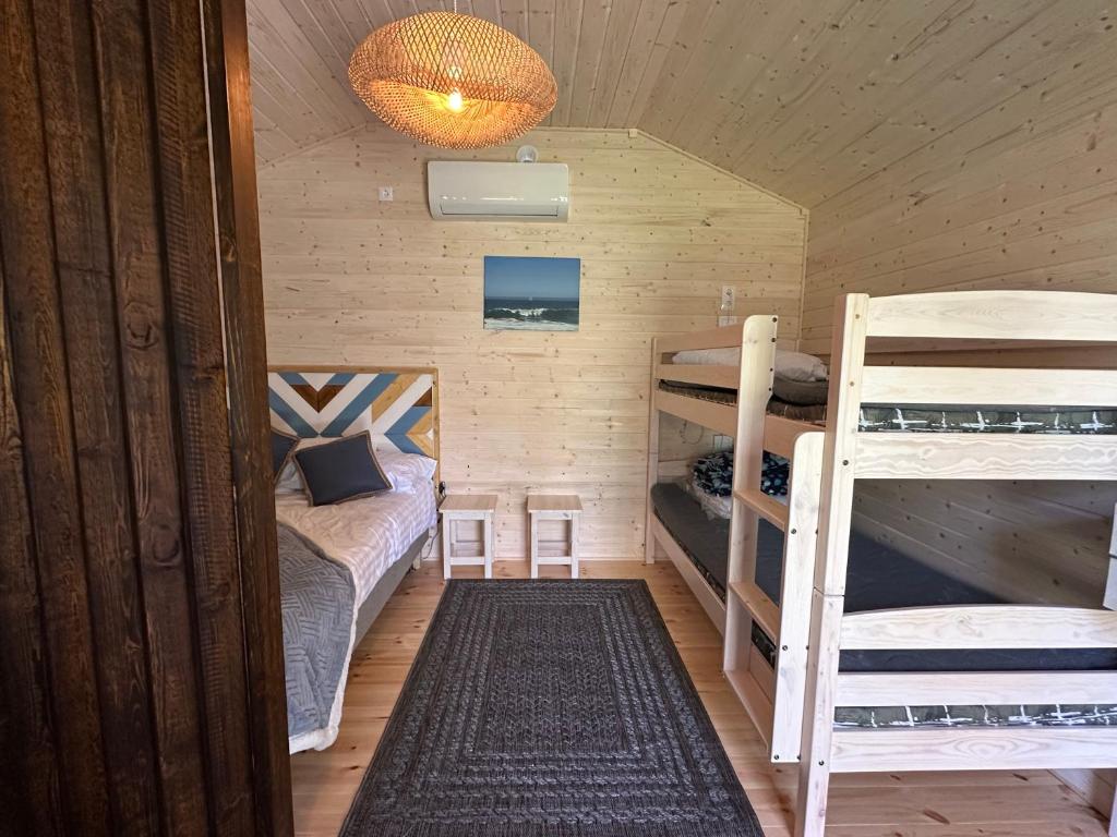 Postel nebo postele na pokoji v ubytování Teeveere Sea house