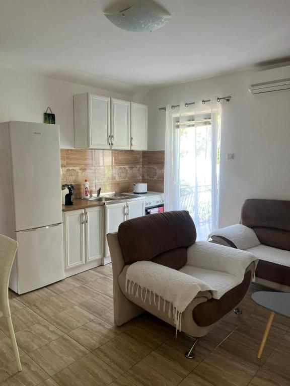 Kuchyň nebo kuchyňský kout v ubytování Apartman Nina2