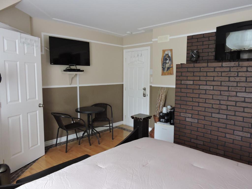 Postel nebo postele na pokoji v ubytování Gite Passion et Tendresse B&B