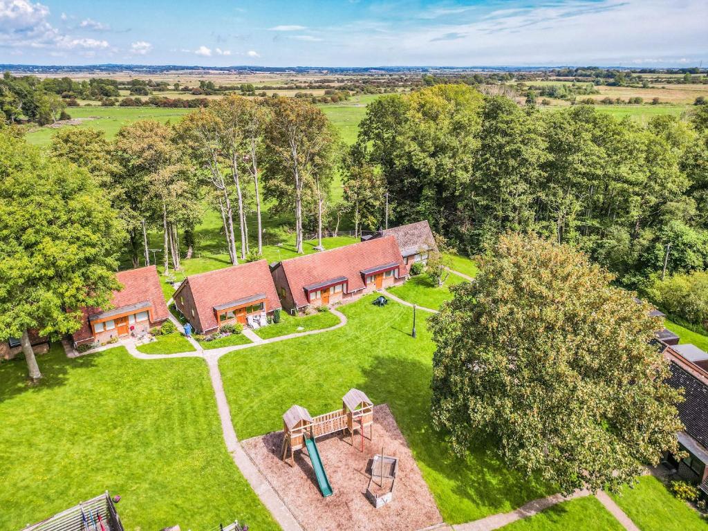 an aerial view of a house with a yard at Sheep's View Cottage in Eastbourne