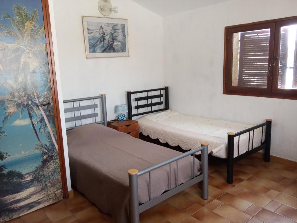 Ένα ή περισσότερα κρεβάτια σε δωμάτιο στο CHAMBRE lumineuse jardin arboré