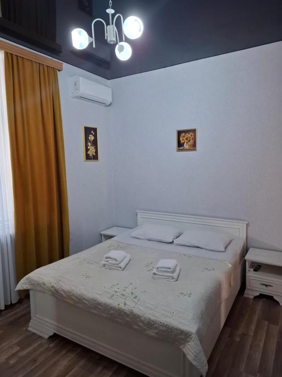 Postel nebo postele na pokoji v ubytování Mango's Guesthouse