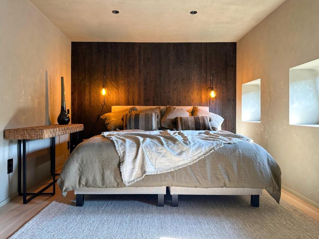 Postel nebo postele na pokoji v ubytování La Vue gîte familial