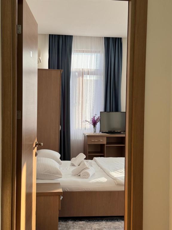 Postel nebo postele na pokoji v ubytování Hotel Port Altus