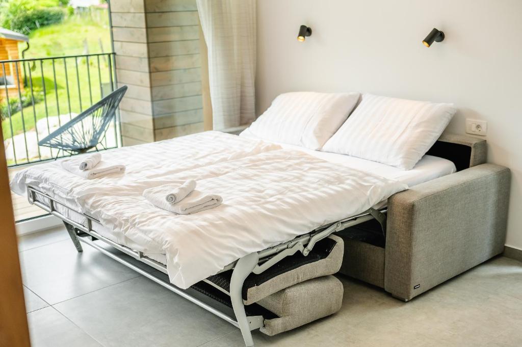 Postel nebo postele na pokoji v ubytování Family apartments Soča Splash Home