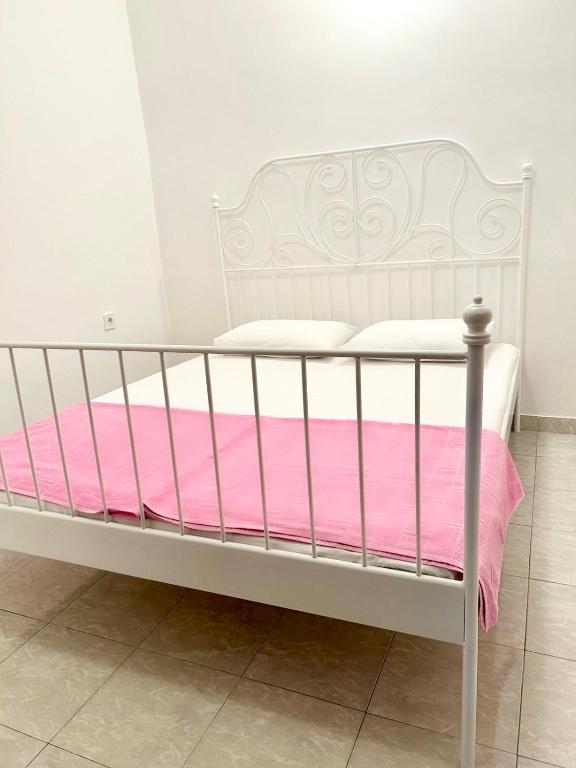 Postel nebo postele na pokoji v ubytování Apartmani i sobe Radojičić