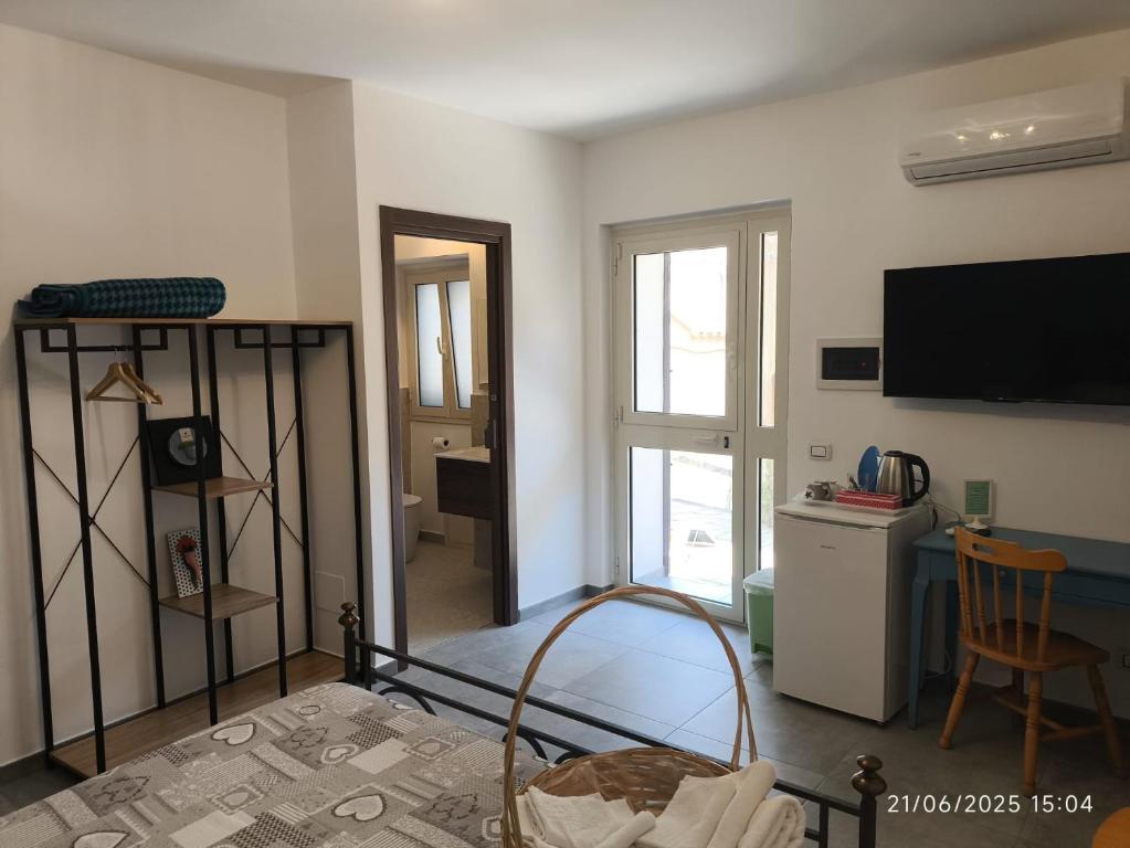 TV a/nebo společenská místnost v ubytování Duomo Rent Room & Flat