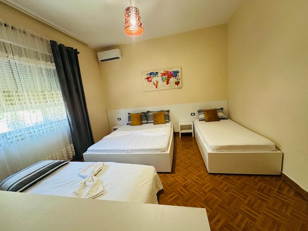 Postel nebo postele na pokoji v ubytování THE DOMI Apartments