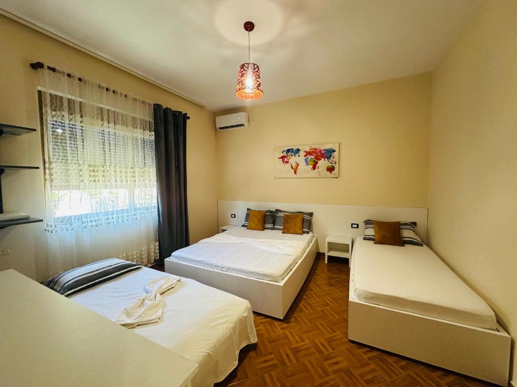 Postel nebo postele na pokoji v ubytování THE DOMI Apartments