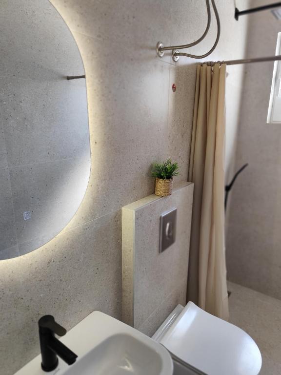 Ванна кімната в Guest House AGA