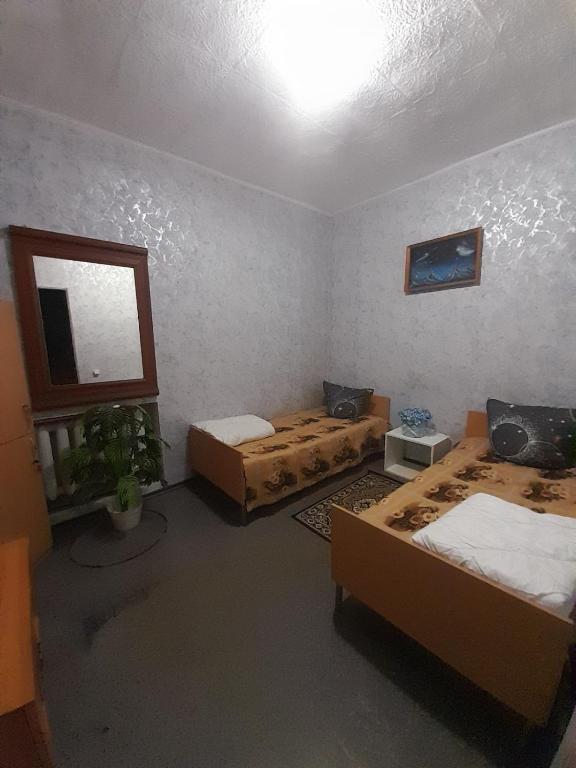 Postel nebo postele na pokoji v ubytování Eva Hostel