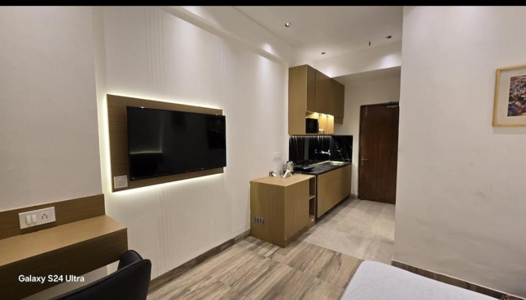 TV a/nebo společenská místnost v ubytování Skyline Studio