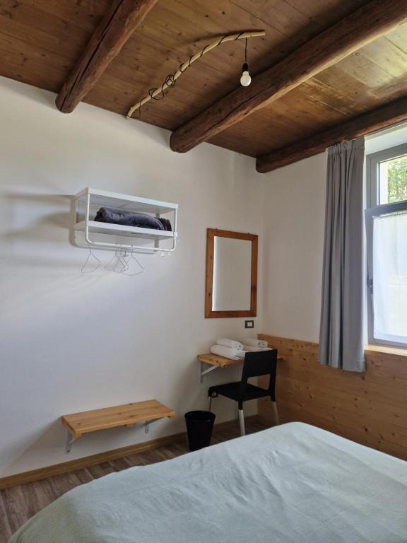 Postel nebo postele na pokoji v ubytování La Vrata Gialla