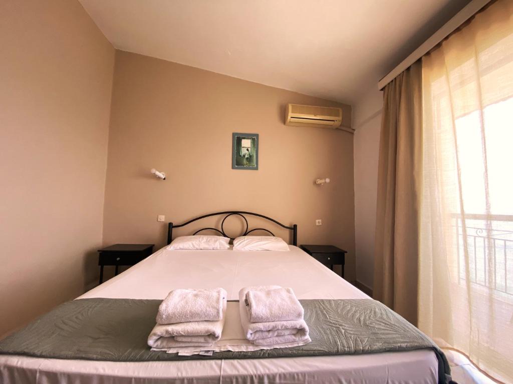 Postel nebo postele na pokoji v ubytování El Greco hotel by Estia