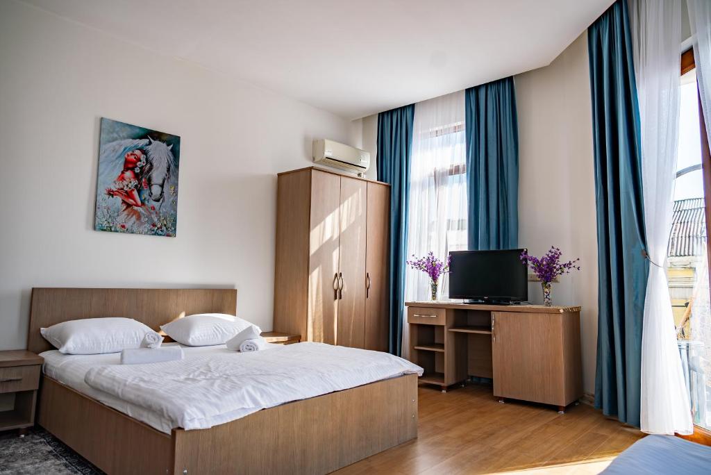 Postel nebo postele na pokoji v ubytování Hotel Port Altus
