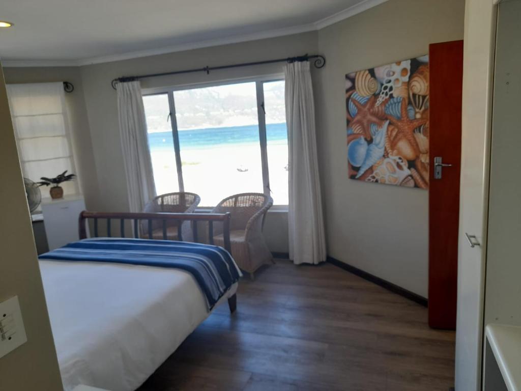 Postel nebo postele na pokoji v ubytování Dune Lodge