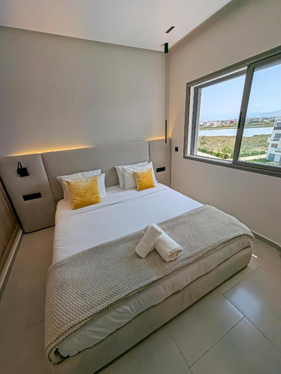 Postel nebo postele na pokoji v ubytování EliteStay by Al Amir