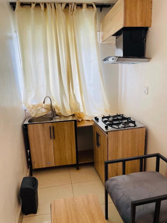 Kuchyň nebo kuchyňský kout v ubytování Hotel Padelia Apartment Airport Road Lagos