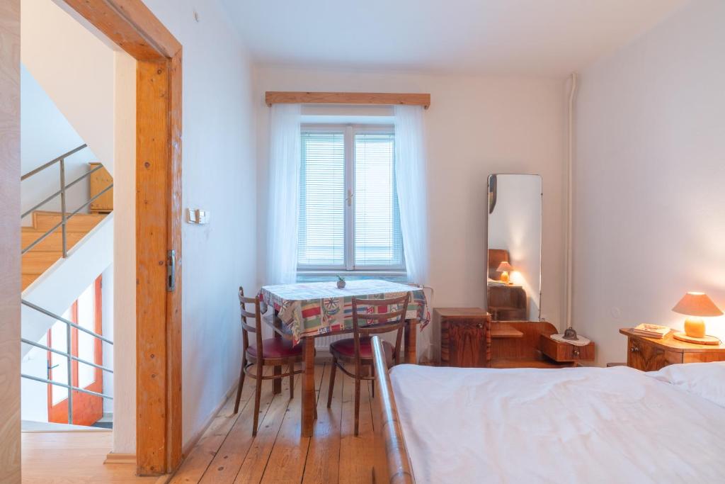 Postel nebo postele na pokoji v ubytování Holiday House Mária