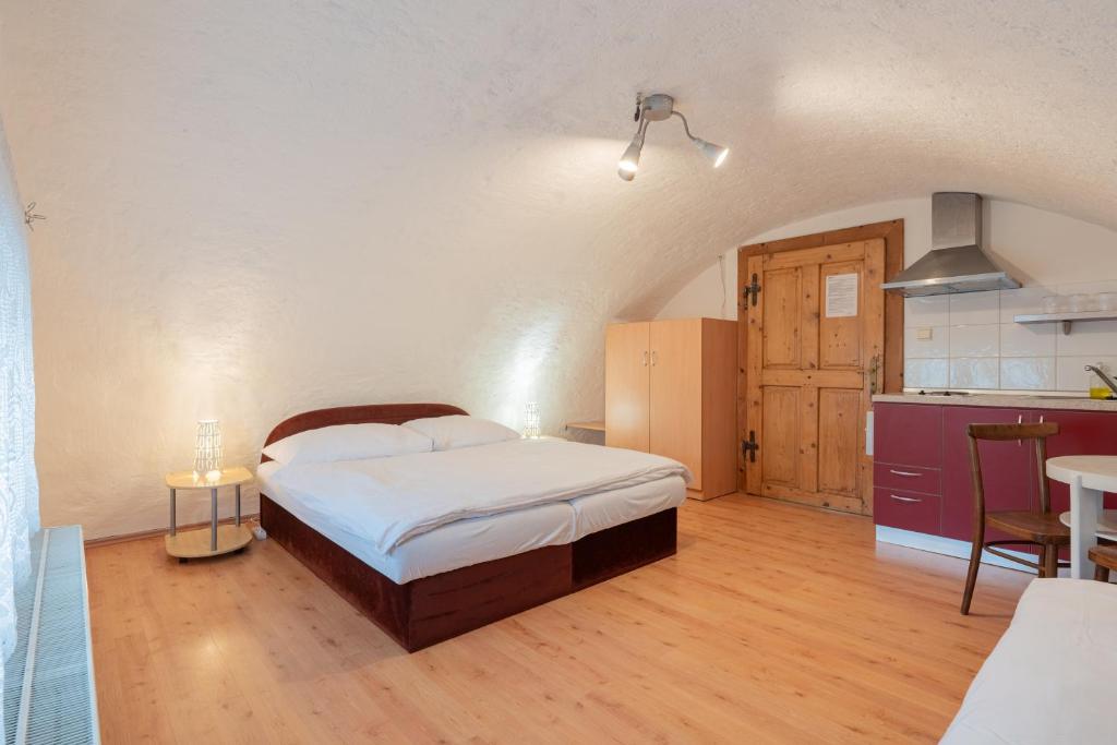 Postel nebo postele na pokoji v ubytování Holiday House Mária