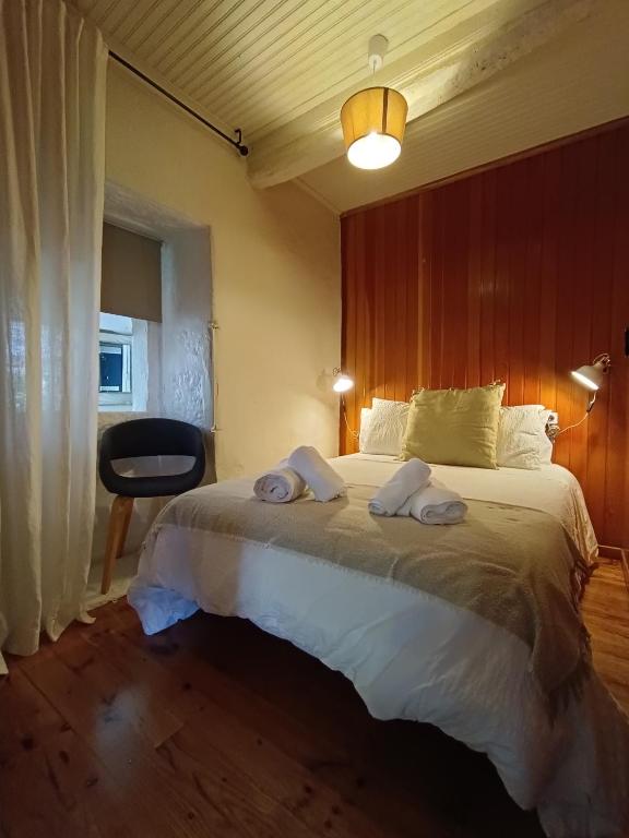 Posteľ alebo postele v izbe v ubytovaní A Viña de Lina. Turismo rural con piscina y finca.