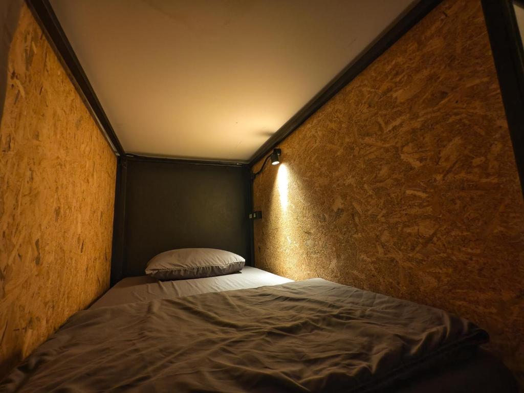 Postel nebo postele na pokoji v ubytování TIMN Hostel Female Only