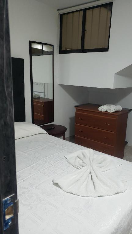 Postel nebo postele na pokoji v ubytování Casa hotel la 33