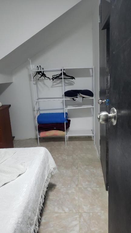 Postel nebo postele na pokoji v ubytování Casa hotel la 33