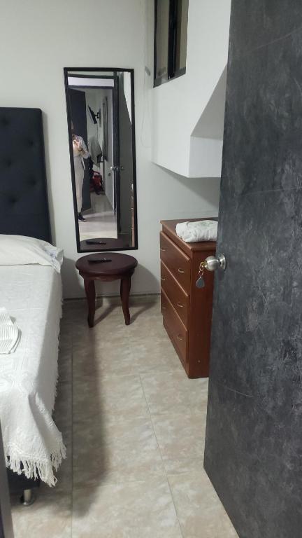 Postel nebo postele na pokoji v ubytování Casa hotel la 33